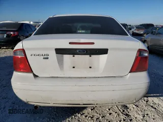 2007 Ford Focus S with VIN 1FAFP34N47W243028, listed as a Copart auction lot 55147695 with 218,672 mi miles and Salvage title. Bid and sale history available at DreamBid. Image 6.