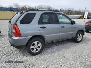 2010 Kia Sportage LX with VIN KNDKG3A45A7706946, listed as a Copart auction lot 50245845 with 111,884 mi miles and Salvage Title. Bid and sale history available at carsss.com. Image 3.