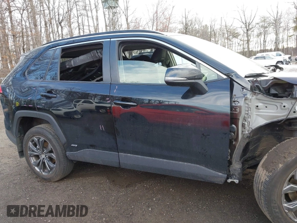 2023 Toyota RAV4 Hybrid XLE Premium with VIN JTMB6RFV5PD115565, listed as a IAAI auction lot 41787098 with 13,386 mi miles. Bid and sale history available at carsss.com. Image 14.