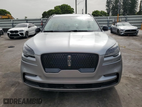 2023 Lincoln Aviator Reserve z VIN 5LM5J7WCXPGL20322, wystawiony jako Copart lot #58003605 z przebiegiem 14 563 mil mil oraz Szkoda całkowita • Salvage title. Historia ofert i sprzedaży dostępna na DreamBid. Obrazek 5.