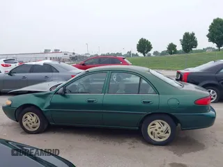 1999 Ford Escort LX z VIN 1FAFP10P1XW230023, wystawiony jako IAAI lot #42486934 z przebiegiem 41 468 mil mil oraz . Historia ofert i sprzedaży dostępna na DreamBid. Obrazek 14.