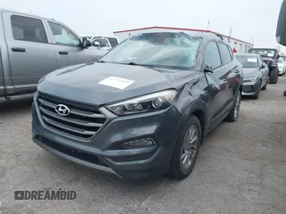 2016 Hyundai Tucson Sport with VIN KM8J33A26GU189300, listed as a IAAI auction lot 41372422 with 94,848 mi miles. Bid and sale history available at carsss.com. Image 2.