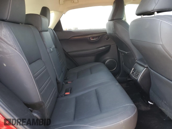 2019 Lexus NX 300h with VIN JTJBJRBZ3K2104153, listed as a Copart auction lot 54352025 with 74,340 mi miles and Salvage title. Bid and sale history available at DreamBid. Image 11.