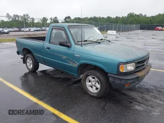 1994 Mazda B-Series Truck z VIN 4F4CR12A9RTM90195, wystawiony jako IAAI lot #42341674 z przebiegiem 120 646 mil mil oraz . Historia ofert i sprzedaży dostępna na DreamBid. Obrazek 1.