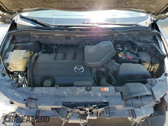 2011 Mazda CX-9 Touring с VIN JM3TB2CA7B0316612, выставлен на аукционе Copart как лот 58545205 с пробегом 128 190 миль миль и Списание • Salvage title. История ставок и продаж доступна на DreamBid. Изображение 12.