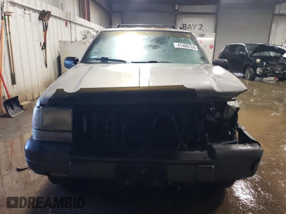 1997 Jeep Grand Cherokee Laredo with VIN 1J4GZ58Y7VC650813, listed as a Copart auction lot 41486724 with 266,004 mi miles and Salvage Title. Bid and sale history available at carsss.com. Image 5.
