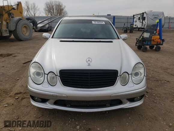 2005 Mercedes-Benz E-Class 5.5L AMG with VIN WDBUF76J05A730404, listed as a Copart auction lot 78168554 with 154,164 mi miles and Clean Title. Bid and sale history available at carsss.com. Image 5.