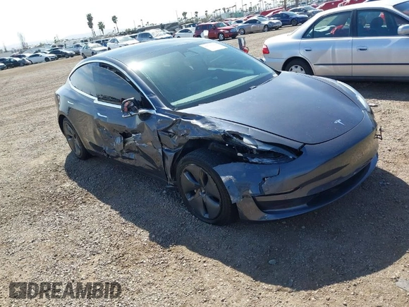2020 Tesla Model 3 Standard Range Plus with VIN 5YJ3E1EA5LF644282, listed as a IAAI auction lot 41710124 with 69,969 mi miles and . Bid and sale history available at DreamBid. Image 1.