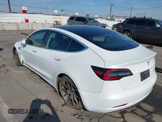 2019 Tesla Model 3 Long Range with VIN 5YJ3E1EB1KF510912, listed as a IAAI auction lot 41857775 with Not Provided miles and . Bid and sale history available at DreamBid. Image 3.
