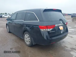 2014 Honda Odyssey EX-L with VIN 5FNRL5H64EB114709, listed as a IAAI auction lot 42131146 with 145,616 mi miles and . Bid and sale history available at DreamBid. Image 3.