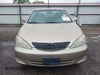 2002 Toyota Camry LE z VIN 4T1BE32K52U086150, wystawiony jako IAAI lot #42126685 z przebiegiem 175 212 mil mil oraz . Historia ofert i sprzedaży dostępna na DreamBid. Obrazek 12.