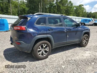 2014 Jeep Cherokee Trailhawk with VIN 1C4PJMBS7EW170345, listed as a Copart auction lot 60565765 with 98,382 mi miles and Salvage title. Bid and sale history available at DreamBid. Image 3.