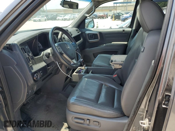 2012 Honda Ridgeline RTL z VIN 5FPYK1F54CB451175, wystawiony jako Copart lot #59536285 z przebiegiem 160 476 mil mil oraz Szkoda całkowita • Salvage title. Historia ofert i sprzedaży dostępna na DreamBid. Obrazek 7.