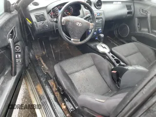2008 Hyundai Tiburon GS z VIN KMHHM66D18U264820, wystawiony jako Copart lot #54485415 z przebiegiem 158 129 mil mil oraz Szkody całkowita. Historia ofert i sprzedaży dostępna na DreamBid. Obrazek 8.
