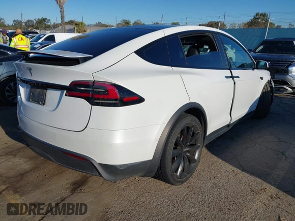 2022 Tesla Model X with VIN 7SAXCBE59NF364984, listed as a IAAI auction lot 41809256 with Not Provided miles and . Bid and sale history available at DreamBid. Image 4.