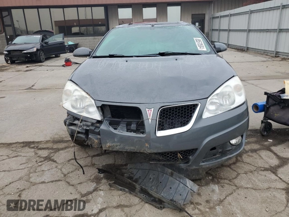2009 Pontiac G6 GT 1SB z VIN 1G2ZK57K994246920, wystawiony jako Copart lot #85570504 z przebiegiem 127 048 mil mil oraz Czysty tytuł • Clean title. Historia ofert i sprzedaży dostępna na DreamBid. Obrazek 5.