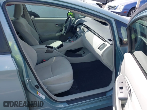 2015 Toyota Prius Four z VIN JTDKN3DU7F1892761, wystawiony jako IAAI lot #42275951 z przebiegiem 256 146 mil mil oraz . Historia ofert i sprzedaży dostępna na DreamBid. Obrazek 5.