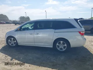 2013 Honda Odyssey Touring with VIN 5FNRL5H96DB009694, listed as a IAAI auction lot 42002487 with 182,867 mi miles and . Bid and sale history available at carsss.com. Image 14.