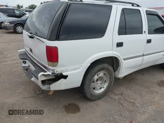 2001 GMC Jimmy SLE z VIN 1GKCS13W312208879, wystawiony jako IAAI lot #42284916 z przebiegiem 204 219 mil mil oraz . Historia ofert i sprzedaży dostępna na DreamBid. Obrazek 6.