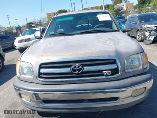 2000 Toyota Tundra SR5 with VIN 5TBRT3415YS083140, listed as a IAAI auction lot 41750409 with 273,717 mi miles. Bid and sale history available at carsss.com. Image 12.