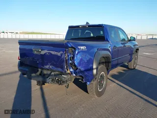 2024 Toyota Tacoma 4WD SR5 with VIN 3TYLB5JN3RT028338, listed as a IAAI auction lot 41870958 with 2,249 mi miles. Bid and sale history available at carsss.com. Image 6.