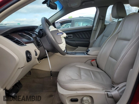 2012 Ford Taurus SEL with VIN 1FAHP2EW0CG133348, listed as a Copart auction lot 83031894 with 231,825 mi miles and Salvage Title. Bid and sale history available at DreamBid. Image 7.