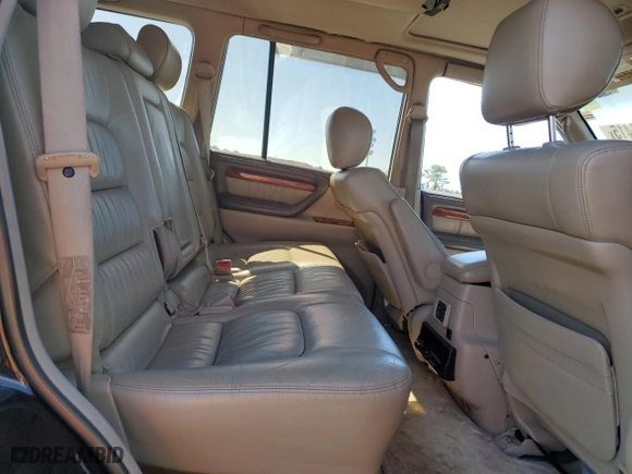 1999 Lexus LX 470 Luxury SUV with VIN JT6HT00W7X0027115, listed as a Copart auction lot 52487415 with 293,253 mi miles and Clean Title. Bid and sale history available at carsss.com. Image 11.