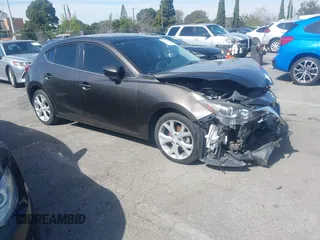 2015 Mazda 3 i Grand Touring z VIN 3MZBM1M76FM189220, wystawiony jako IAAI lot #41602142 z przebiegiem 93 314 mil mil oraz . Historia ofert i sprzedaży dostępna na DreamBid. Obrazek 1.