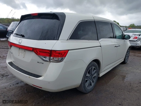 2015 Honda Odyssey Touring Elite with VIN 5FNRL5H98FB076428, listed as a IAAI auction lot 41998339 with 114,573 mi miles. Bid and sale history available at carsss.com. Image 4.