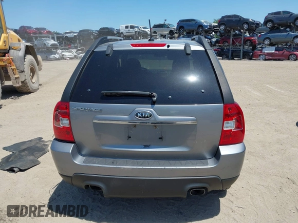 2010 Kia Sportage LX with VIN KNDKG3A47A7722839, listed as a IAAI auction lot 42017569 with 187,100 mi miles and . Bid and sale history available at carsss.com. Image 16.