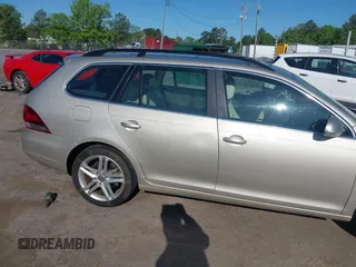 2014 Volkswagen Jetta SportWagen TDI w/Sunroof & Nav with VIN 3VWPL7AJ7EM614938, listed as a IAAI auction lot 42121788 with 189,917 mi miles. Bid and sale history available at carsss.com. Image 6.