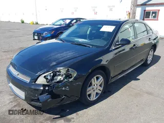 2014 Chevrolet Impala LT with VIN 2G1WB5E30E1166401, listed as a IAAI auction lot 42071504 with 158,813 mi miles and . Bid and sale history available at DreamBid. Image 6.