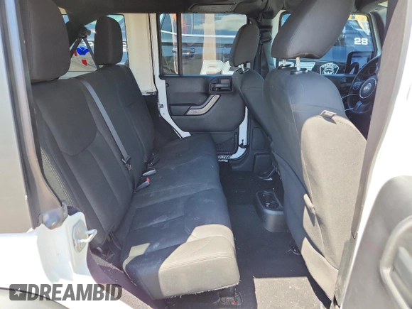 2015 Jeep Wrangler Unlimited Freedom with VIN 1C4HJWDGXFL755528, listed as a Copart auction lot 64927525 with 111,096 mi miles and Salvage title. Bid and sale history available at DreamBid. Image 10.