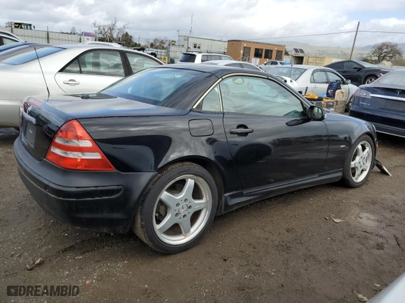 2002 Mercedes-Benz SLK-Class 3.2L with VIN WDBKK65F42F241268, listed as a Copart auction lot 45150305 with 164,998 mi miles and Salvage Title. Bid and sale history available at carsss.com. Image 3.