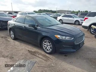2014 Ford Fusion SE with VIN 3FA6P0HD3ER184294, listed as a IAAI auction lot 42141660 with 216,696 mi miles. Bid and sale history available at carsss.com. Image 1.