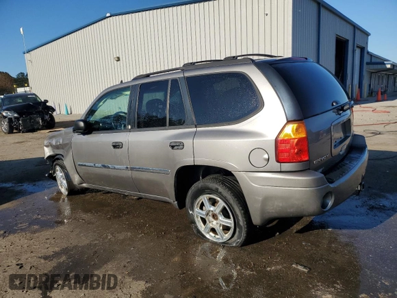 2009 GMC Envoy SLE with VIN 1GKDS33SX92131159, listed as a Copart auction lot 82487404 with 224,391 mi miles and Salvage Title. Bid and sale history available at carsss.com. Image 2.