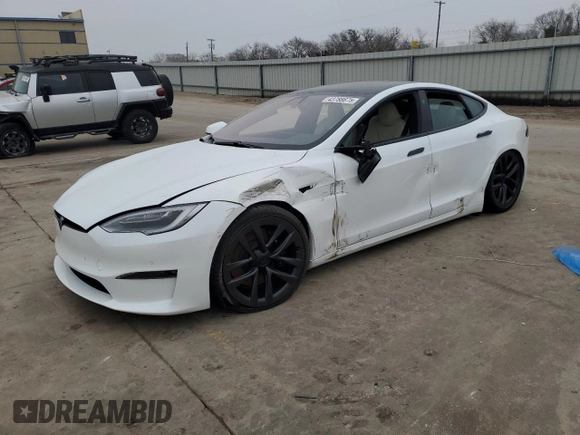 2021 Tesla Model S Plaid с VIN 5YJSA1E6XMF455258, выставлен на аукционе Copart как лот 43788675 с пробегом Не указан миль и Списание • Salvage title. История ставок и продаж доступна на DreamBid. Изображение 1.