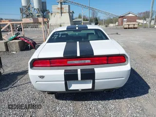 2012 Dodge Challenger SXT Plus with VIN 2C3CDYAG0CH196344, listed as a IAAI auction lot 42005410 with 203,655 mi miles. Bid and sale history available at carsss.com. Image 16.