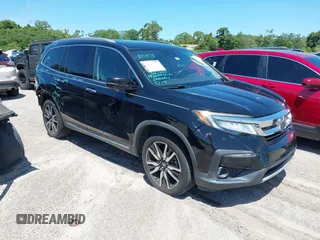 2019 Honda Pilot Touring 7-Passenger with VIN 5FNYF5H63KB010081, listed as a IAAI auction lot 42345205 with 114,360 mi miles and . Bid and sale history available at DreamBid. Image 1.
