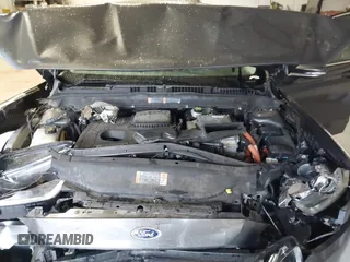 2016 Ford Fusion SE Hybrid with VIN 3FA6P0LU2GR388787, listed as a IAAI auction lot 41733661 with 86,078 mi miles and . Bid and sale history available at DreamBid. Image 10.