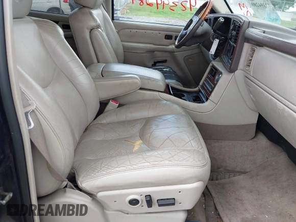 2004 Cadillac Escalade z VIN 1GYEK63N84R211615, wystawiony jako IAAI lot #42394289 z przebiegiem 298 520 mil mil oraz . Historia ofert i sprzedaży dostępna na DreamBid. Obrazek 5.
