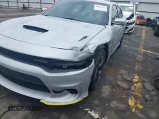 2019 Dodge Charger R/T with VIN 2C3CDXCTXKH757197, listed as a IAAI auction lot 41860544 with 98,820 mi miles and . Bid and sale history available at DreamBid. Image 6.