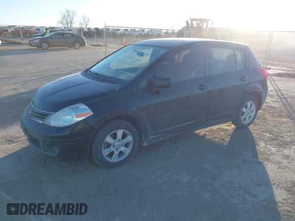 2012 Nissan Versa S with VIN 3N1BC1CP8CK212174, listed as a IAAI auction lot 41430834 with 116,619 mi miles. Bid and sale history available at carsss.com. Image 2.