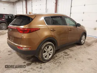 2018 Kia Sportage LX with VIN KNDPM3AC2J7381114, listed as a IAAI auction lot 41214824 with 82,178 mi miles and . Bid and sale history available at carsss.com. Image 4.