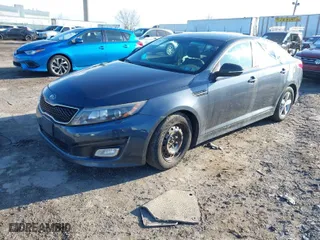 2015 Kia Optima LX with VIN 5XXGM4A75FG394494, listed as a IAAI auction lot 41596274 with 1 mi miles. Bid and sale history available at carsss.com. Image 2.