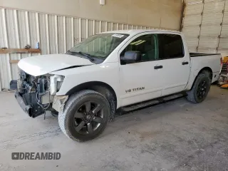 2015 Nissan Titan SV with VIN 1N6BA0ED5FN511603, listed as a Copart auction lot 61668045 with 157,549 mi miles and Salvage title. Bid and sale history available at DreamBid. Image 1.