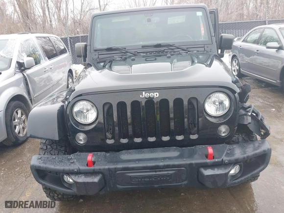2015 Jeep Wrangler Unlimited Rubicon Hard Rock with VIN 1C4HJWFG9FL569962, listed as a IAAI auction lot 41557801 with 78,597 mi miles. Bid and sale history available at carsss.com. Image 12.