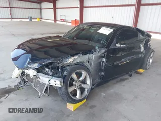 2008 Nissan 350Z z VIN JN1BZ34D98M705867, wystawiony jako IAAI lot #41871586 z przebiegiem 90 717 mil mil oraz . Historia ofert i sprzedaży dostępna na DreamBid. Obrazek 17.