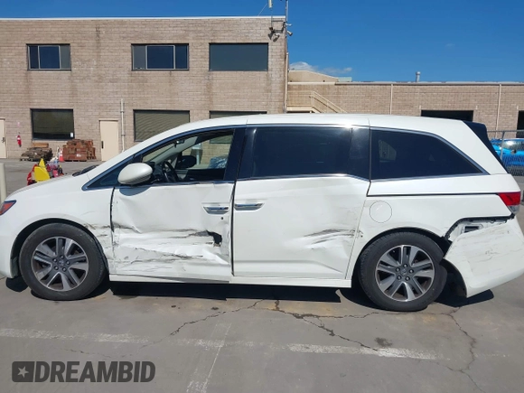 2015 Honda Odyssey Touring Elite with VIN 5FNRL5H91FB038099, listed as a IAAI auction lot 41829649 with 167,017 mi miles and . Bid and sale history available at DreamBid. Image 14.