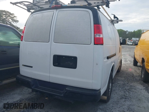 2020 Chevrolet Express Cargo with VIN 1GCWGAFP0L1261725, listed as a IAAI auction lot 42090746 with 67,851 mi miles and . Bid and sale history available at DreamBid. Image 16.